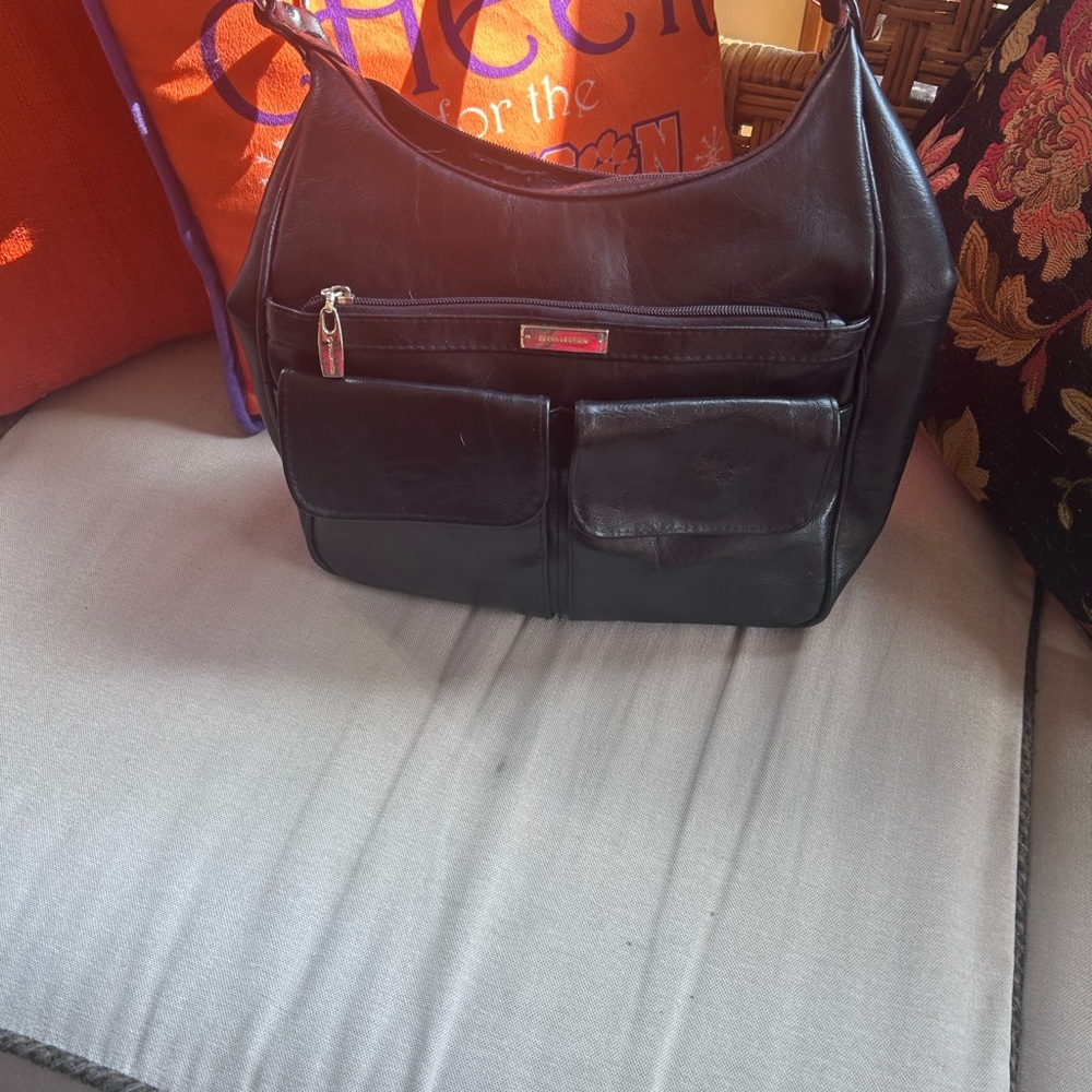 Black Leather Handbag with Red Accents